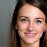 Photo of satisfied client Anna Müller.